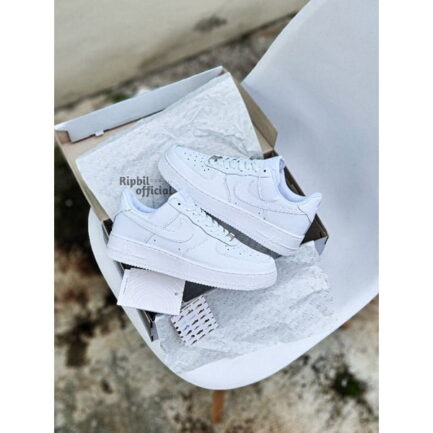 Nike Air Force 1 Triple White sneakers side view in Pakistan.