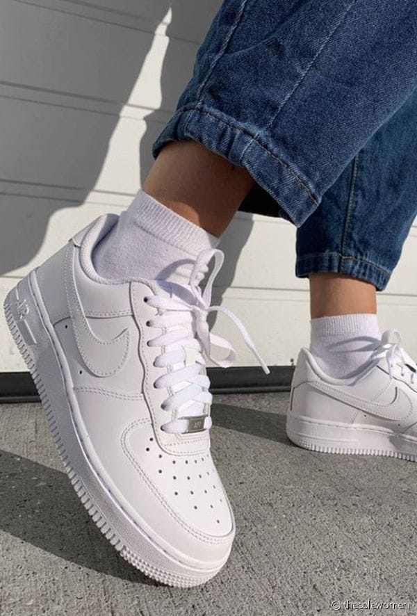 Front angle of Nike Air Force 1 Triple White casual sneakers.
